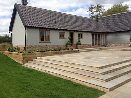 Hard landscaping and oak staircase